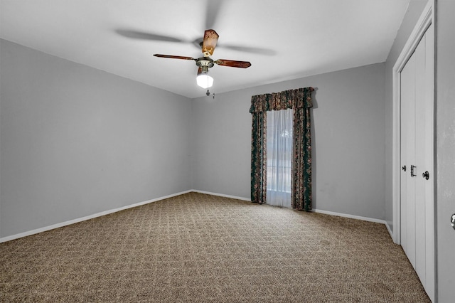 unfurnished bedroom with carpet floors, a closet, and ceiling fan