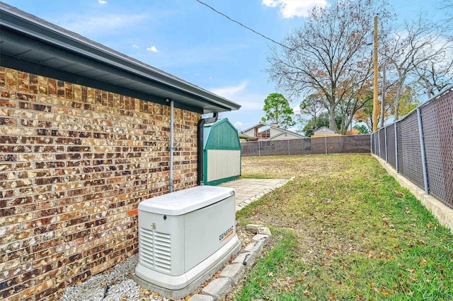 view of yard featuring a patio area and a shed