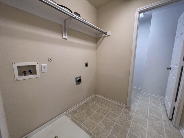 4133 Kyndra Cir, Richardson, TX 75082 - laundry area featuring washer hookup, gas dryer hookup, electric dryer hookup, baseboards, and laundry area