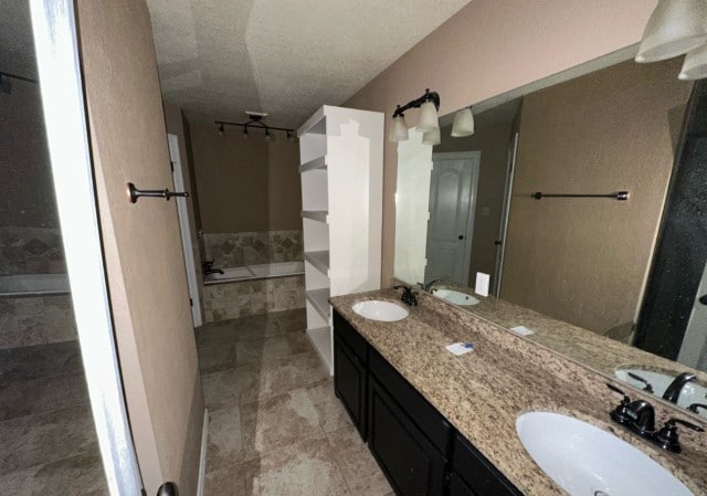 bathroom featuring a bathtub and vanity