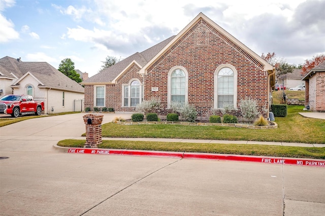 view of front of home with a front yard