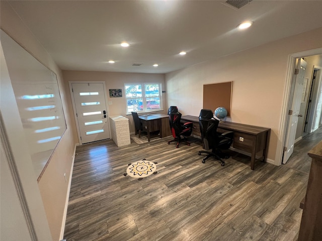 office with dark hardwood / wood-style floors