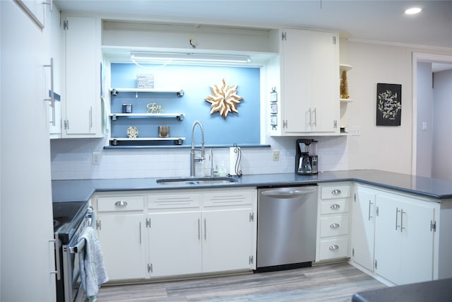 kitchen with white cabinetry and appliances with stainless steel finishes