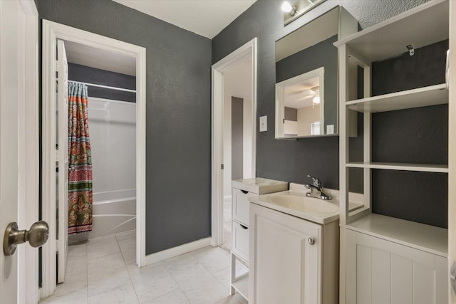 bathroom with vanity and shower / bath combo