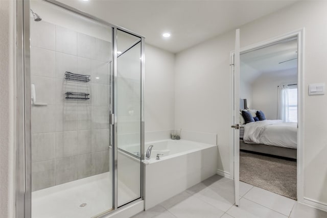 bathroom with tile patterned flooring and plus walk in shower