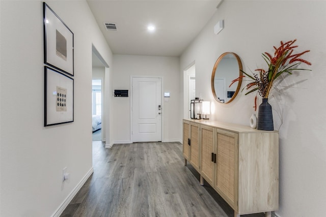 hallway with light wood-type flooring