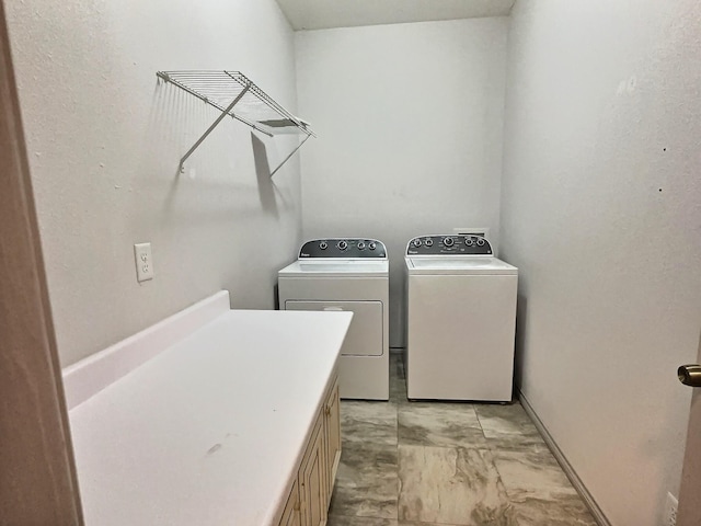 laundry area featuring independent washer and dryer