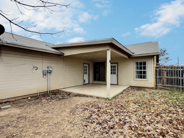 rear view of house with a patio