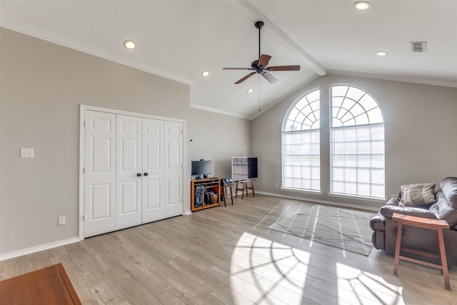 living area featuring vaulted ceiling with beams, ceiling fan, crown molding, and light hardwood / wood-style flooring