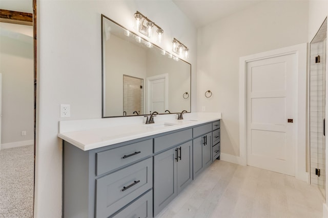 bathroom featuring vanity and walk in shower