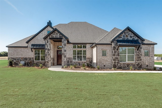 view of front facade with a front yard