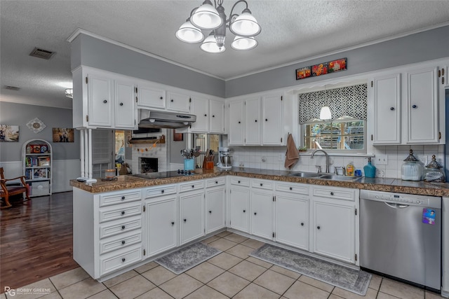 kitchen featuring dishwasher, sink, and white cabinets