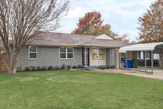 ranch-style house with a front yard and a carport