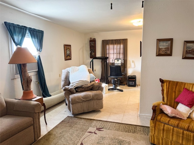 living room featuring light tile patterned floors