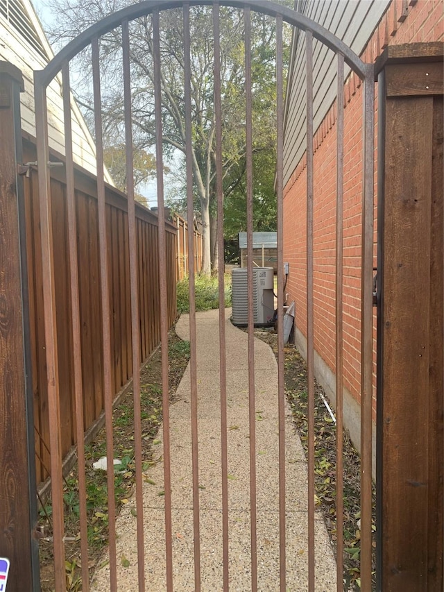 view of yard featuring central air condition unit