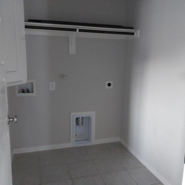 laundry area with washer hookup, hookup for a gas dryer, hookup for an electric dryer, and tile patterned flooring