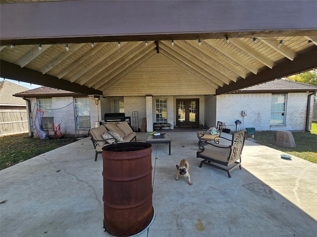 view of patio with outdoor lounge area and french doors