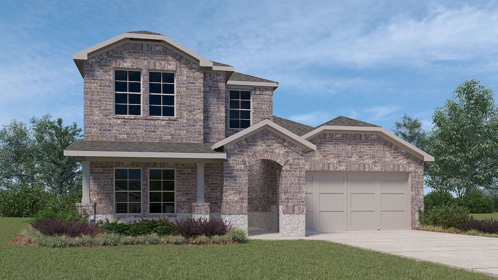 view of front facade with a garage and a front lawn