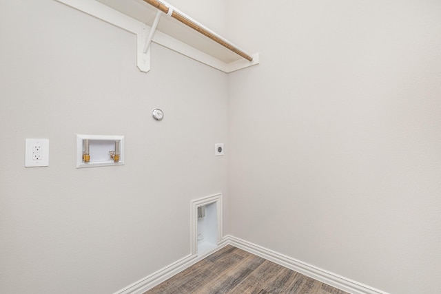 clothes washing area featuring washer hookup, hardwood / wood-style flooring, and electric dryer hookup