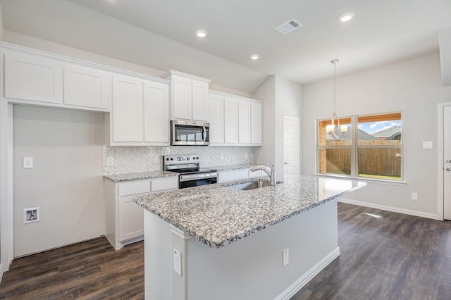 kitchen with dark hardwood / wood-style flooring, white cabinetry, sink, and appliances with stainless steel finishes