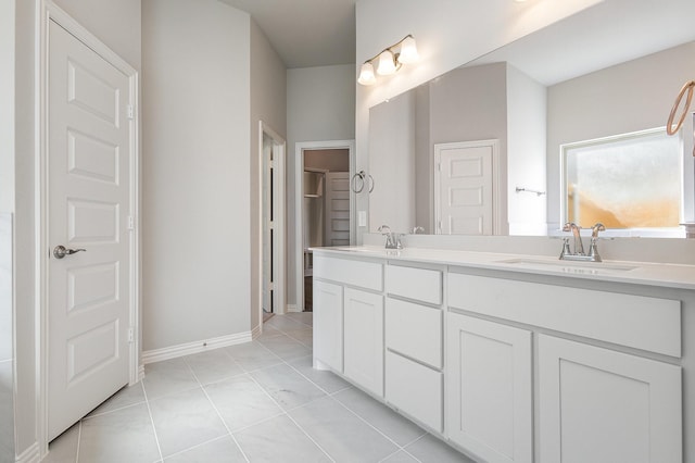 bathroom with vanity and tile patterned floors