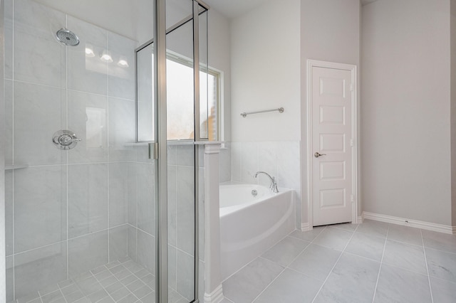 bathroom featuring separate shower and tub and tile patterned flooring