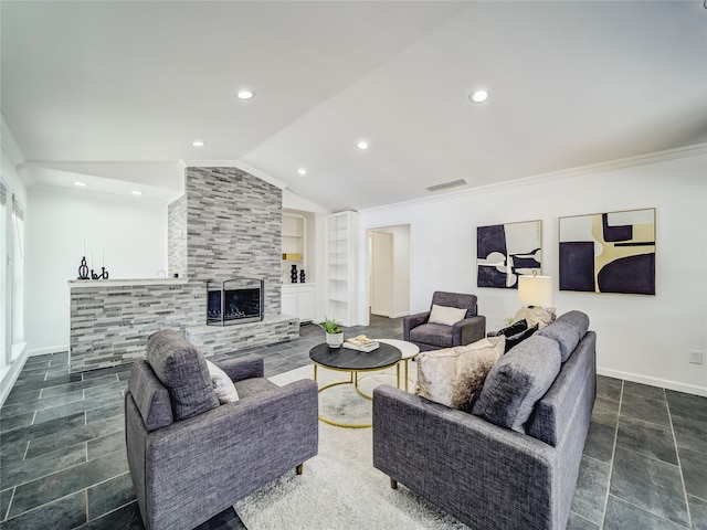 living room with a tile fireplace, crown molding, built in features, and lofted ceiling