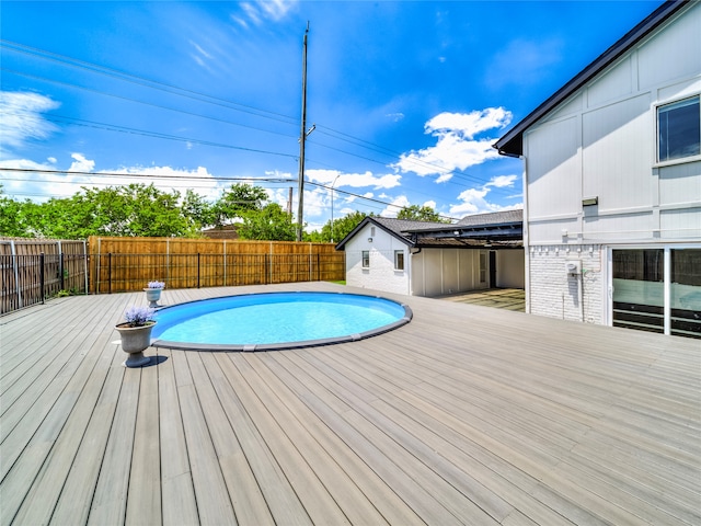 view of pool featuring a deck