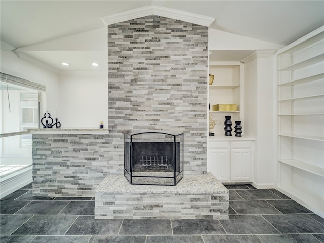 living room featuring a tile fireplace, crown molding, built in features, and lofted ceiling