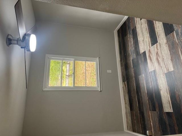 empty room featuring a textured ceiling