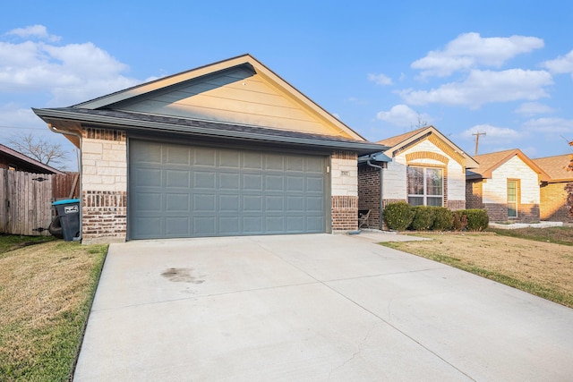 ranch-style house with a front yard and a garage