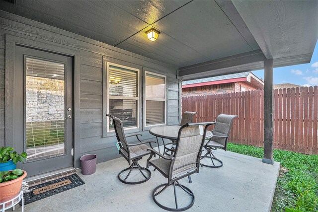 view of patio featuring a porch