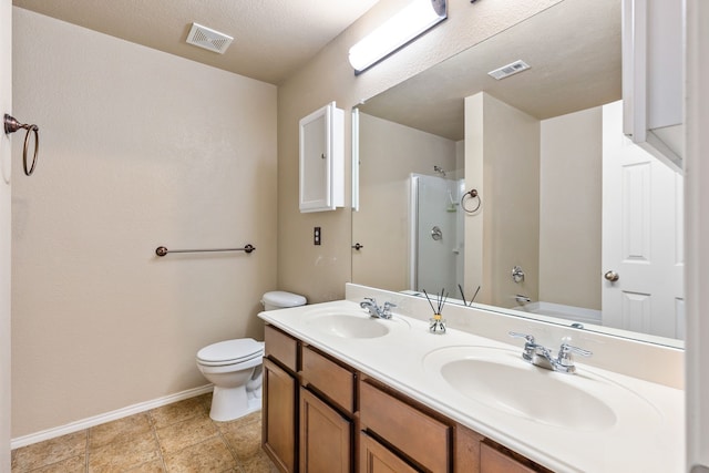 full bathroom with vanity, tile patterned floors, toilet, a textured ceiling, and tub / shower combination