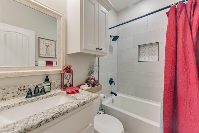 full bathroom with toilet, vanity, and shower / tub combo with curtain