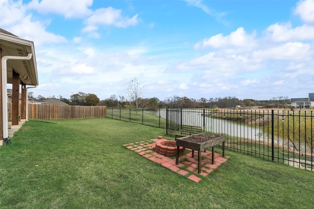 view of yard with a water view