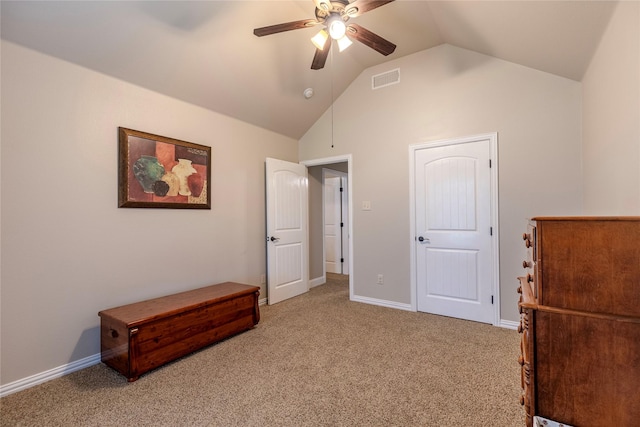 carpeted bedroom with ceiling fan and lofted ceiling