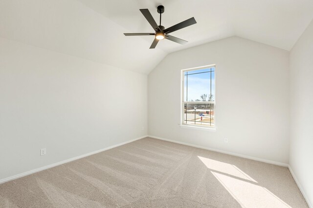 carpeted bedroom featuring ceiling fan and lofted ceiling