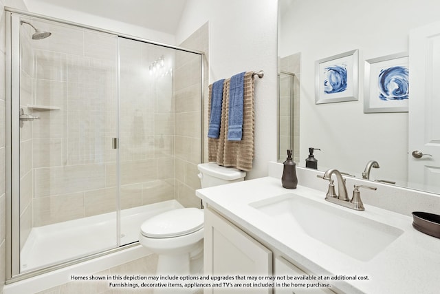 bathroom featuring lofted ceiling, vanity, toilet, and a shower with shower door