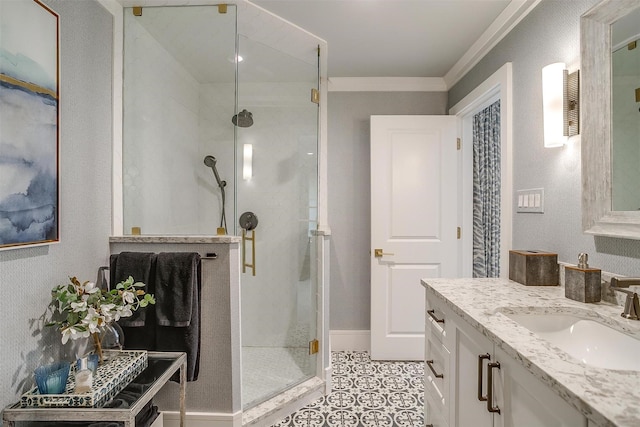 bathroom with tile patterned flooring, vanity, crown molding, and walk in shower