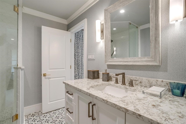 bathroom with crown molding, vanity, tile patterned flooring, and walk in shower