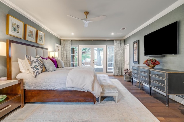 bedroom with hardwood / wood-style flooring, crown molding, access to outside, and french doors