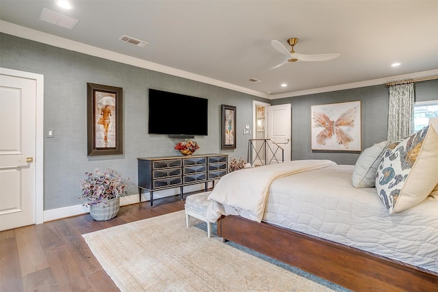 bedroom featuring wood-type flooring, ornamental molding, and ceiling fan