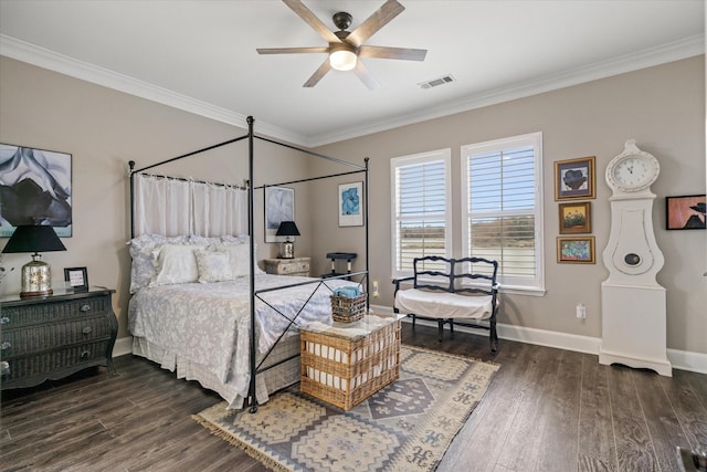 bedroom featuring crown molding, dark hardwood / wood-style floors, and ceiling fan