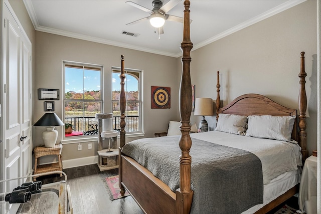 bedroom featuring crown molding, ceiling fan, and dark hardwood / wood-style floors