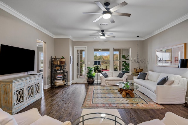 living room featuring ornamental molding, dark hardwood / wood-style floors, ceiling fan with notable chandelier, and a healthy amount of sunlight