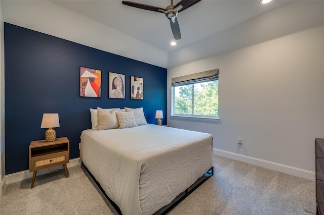 carpeted bedroom with ceiling fan