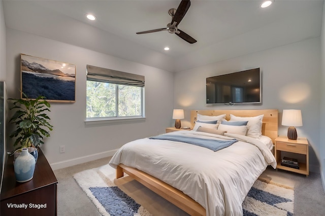 carpeted bedroom with ceiling fan