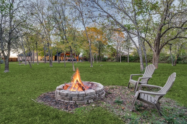 view of yard with an outdoor fire pit