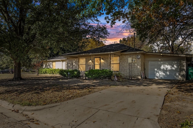 view of front of property with a garage