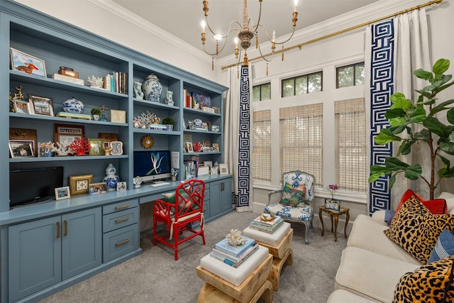 interior space featuring ornamental molding, built in desk, and an inviting chandelier